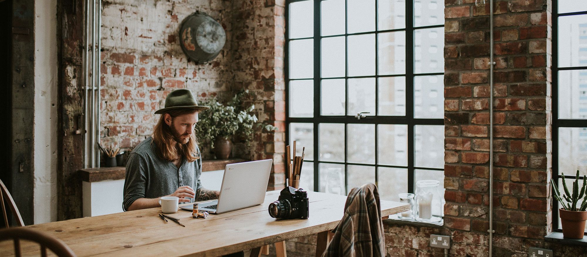 Marketing specialist reviewing campaign performance on a laptop
